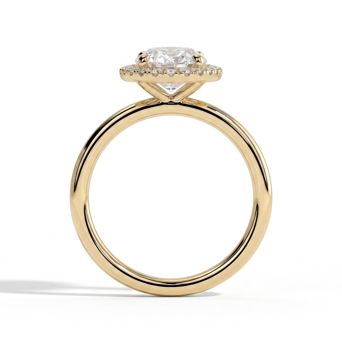 Oval lab-grown diamond halo engagement ring in 18K (750) yellow gold, side profile 