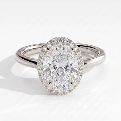 Oval lab-grown diamond halo engagement ring in 18K (750) white gold, front view 
