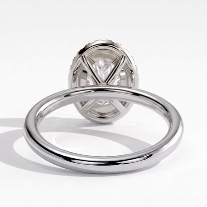 Oval lab-grown diamond halo engagement ring in 950 platinum, on white background 