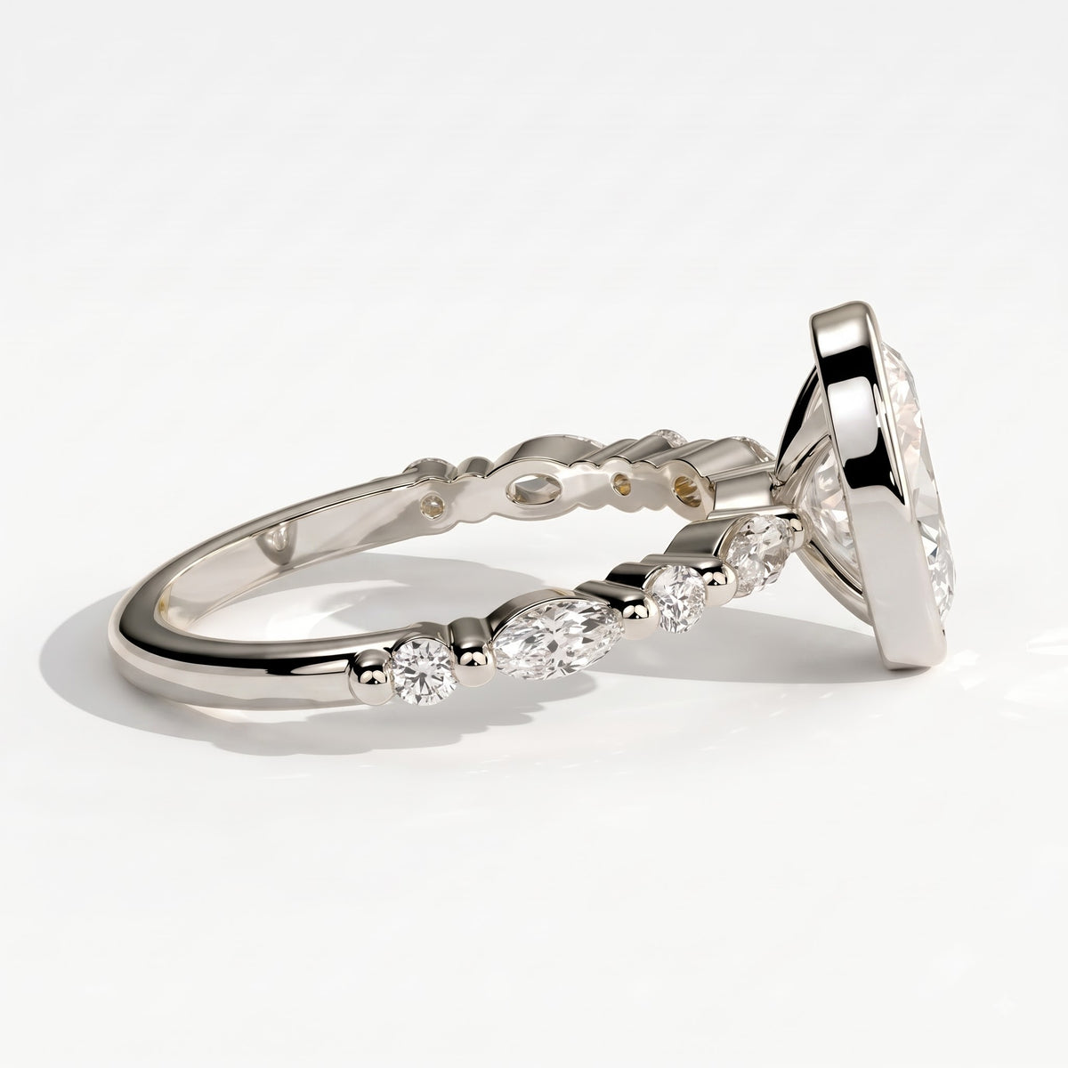 Oval lab-grown diamond bezel-set halo engagement ring in 950 platinum, detail view 
