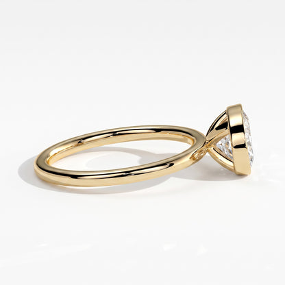 Oval lab-grown diamond bezel-set east-west solitaire engagement ring in 18K (750) yellow gold, detail view 