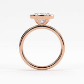 Oval lab-grown diamond bezel-set east-west solitaire engagement ring in 18K (750) rose gold, side profile 