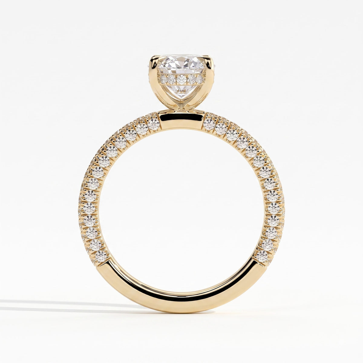 Oval lab-grown diamond halo engagement ring in 14K (585) yellow gold, side profile 