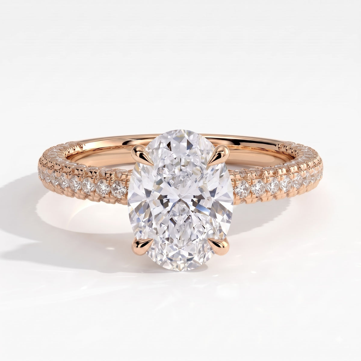 Oval lab-grown diamond halo engagement ring in 14K (585) rose gold, front view 