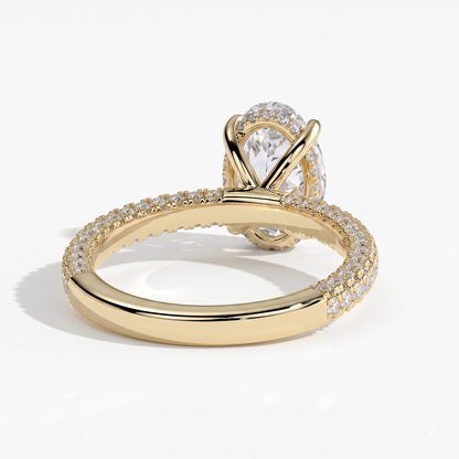 Oval lab-grown diamond halo engagement ring in 14K (585) yellow gold, on white background 