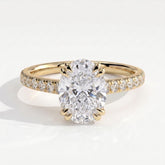 Oval lab-grown diamond halo engagement ring in 14K (585) yellow gold, front view 