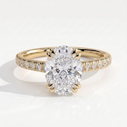 Oval lab-grown diamond halo engagement ring in 14K (585) yellow gold, front view 