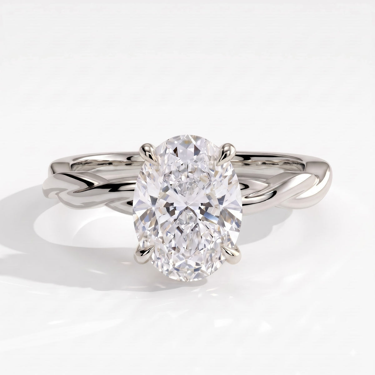 Oval lab-grown diamond solitaire engagement ring in 18K (750) white gold, front view 