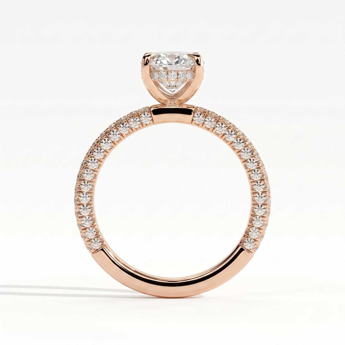 Oval lab-grown diamond halo engagement ring in 18K (750) rose gold, side profile 