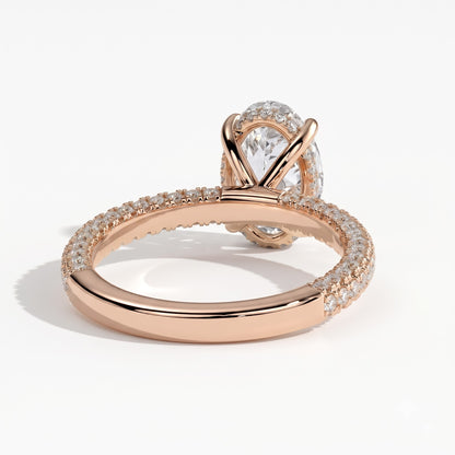Oval lab-grown diamond halo engagement ring in 18K (750) rose gold, on white background 