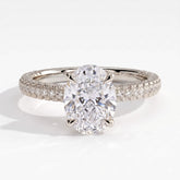 Oval lab-grown diamond halo engagement ring in 18K (750) white gold, front view 