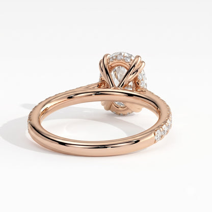Oval lab-grown diamond halo engagement ring in 18K (750) rose gold, on white background 