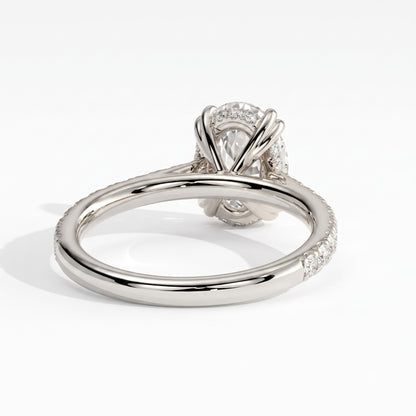 Oval lab-grown diamond halo engagement ring in 18K (750) white gold, on white background 