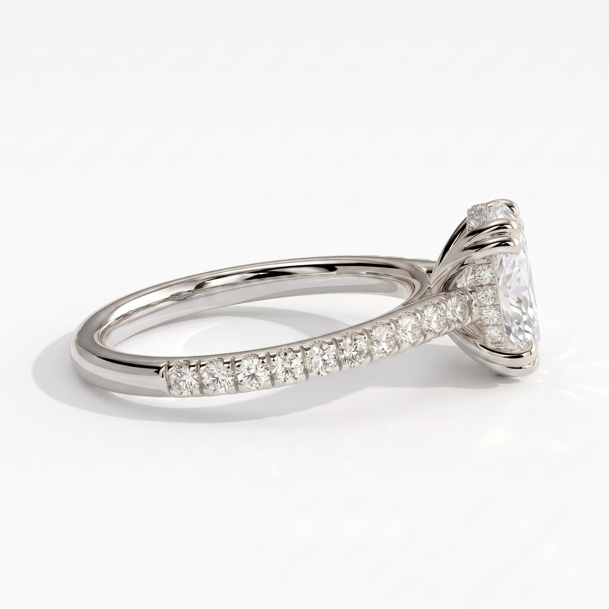 Oval lab-grown diamond halo engagement ring in 950 platinum, detail view 