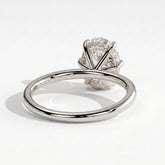 Oval lab-grown diamond solitaire engagement ring in 14K (585) white gold, on white background 
