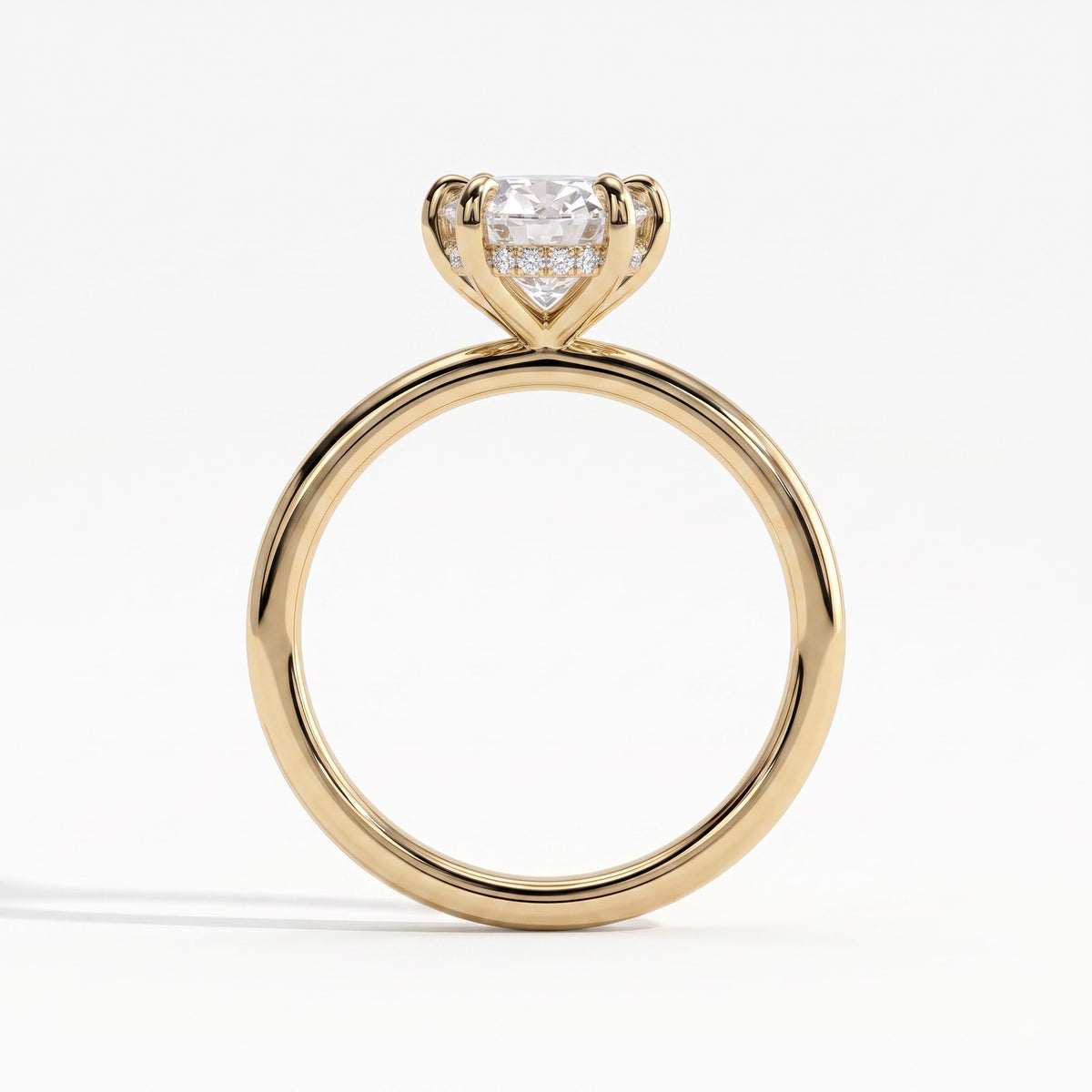 Oval lab-grown diamond solitaire engagement ring in 14K (585) yellow gold, side profile 
