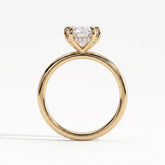 Oval lab-grown diamond solitaire engagement ring in 14K (585) yellow gold, side profile 