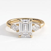 Emerald lab-grown diamond three-stone engagement ring in 14K (585) yellow gold, front view 