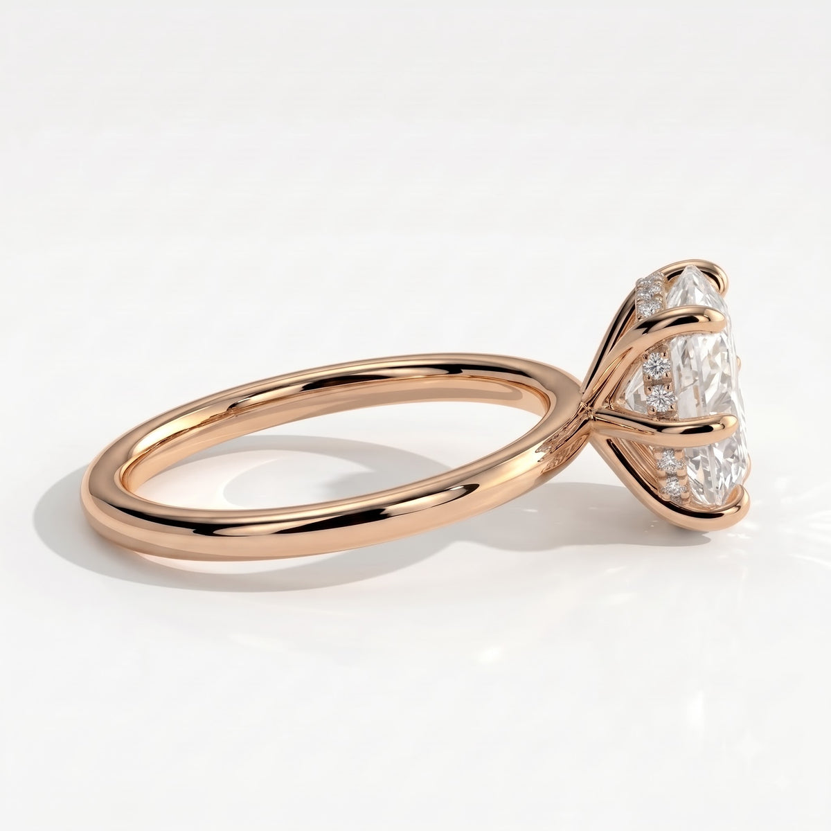 Oval lab-grown diamond solitaire engagement ring in 18K (750) rose gold, detail view 