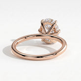 Oval lab-grown diamond solitaire engagement ring in 18K (750) rose gold, on white background 