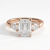 Emerald lab-grown diamond three-stone engagement ring in 18K (750) rose gold, front view 