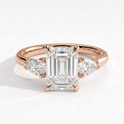 Emerald lab-grown diamond three-stone engagement ring in 18K (750) rose gold, front view 