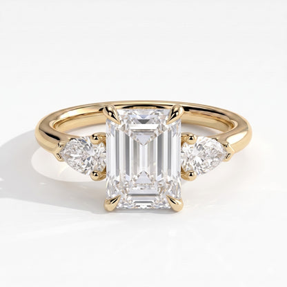 Emerald lab-grown diamond three-stone engagement ring in 18K (750) yellow gold, front view 