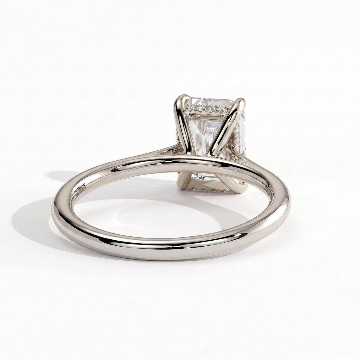 Radiant lab-grown diamond halo engagement ring in 18K (750) white gold, on white background 