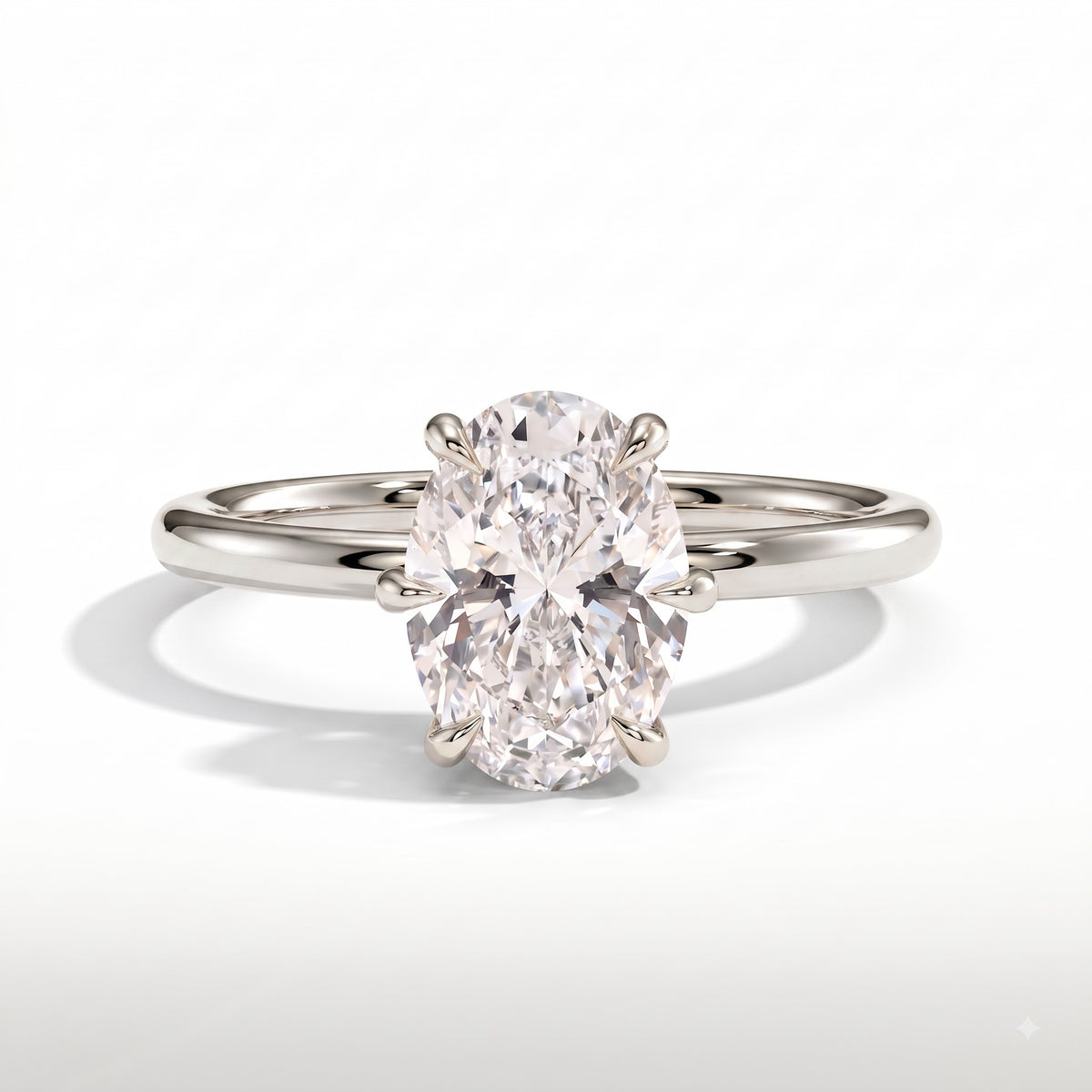 Oval lab-grown diamond solitaire engagement ring in 950 platinum, front view 