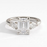 Emerald lab-grown diamond three-stone engagement ring in 950 platinum, front view 