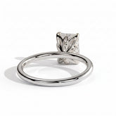 Emerald lab-grown diamond solitaire engagement ring in 18K (750) white gold, on white background 