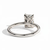 Emerald lab-grown diamond halo engagement ring in 14K (585) white gold, on white background 