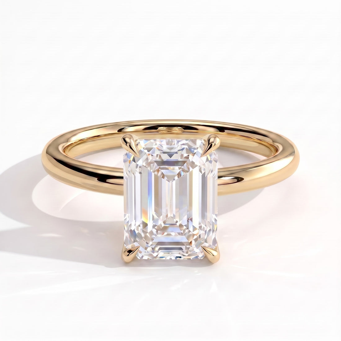 Emerald lab-grown diamond halo engagement ring in 14K (585) yellow gold, front view 