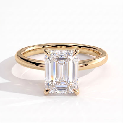 Emerald lab-grown diamond halo engagement ring in 14K (585) yellow gold, front view 