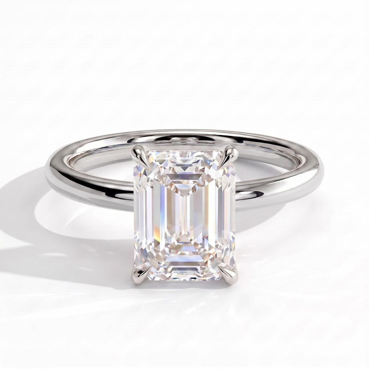 Emerald lab-grown diamond halo engagement ring in 14K (585) white gold, front view 