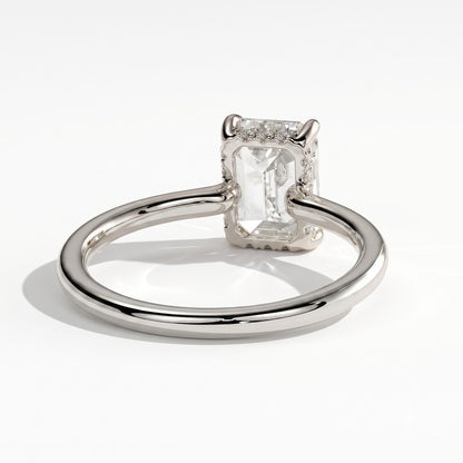 Emerald lab-grown diamond solitaire engagement ring in 950 platinum, on white background 