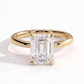 Emerald lab-grown diamond halo engagement ring in 18K (750) yellow gold, front view 