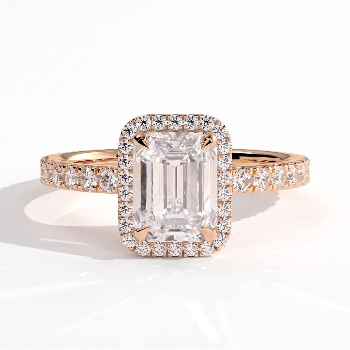 Emerald lab-grown diamond halo engagement ring in 14K (585) rose gold, front view 