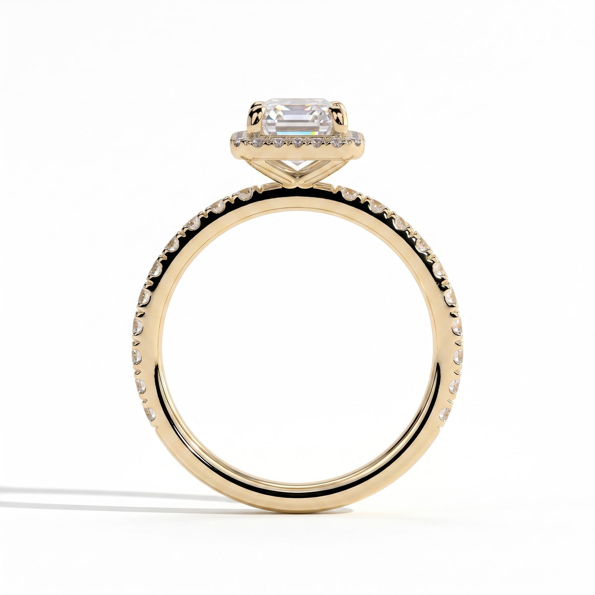Emerald lab-grown diamond halo engagement ring in 18K (750) yellow gold, side profile 