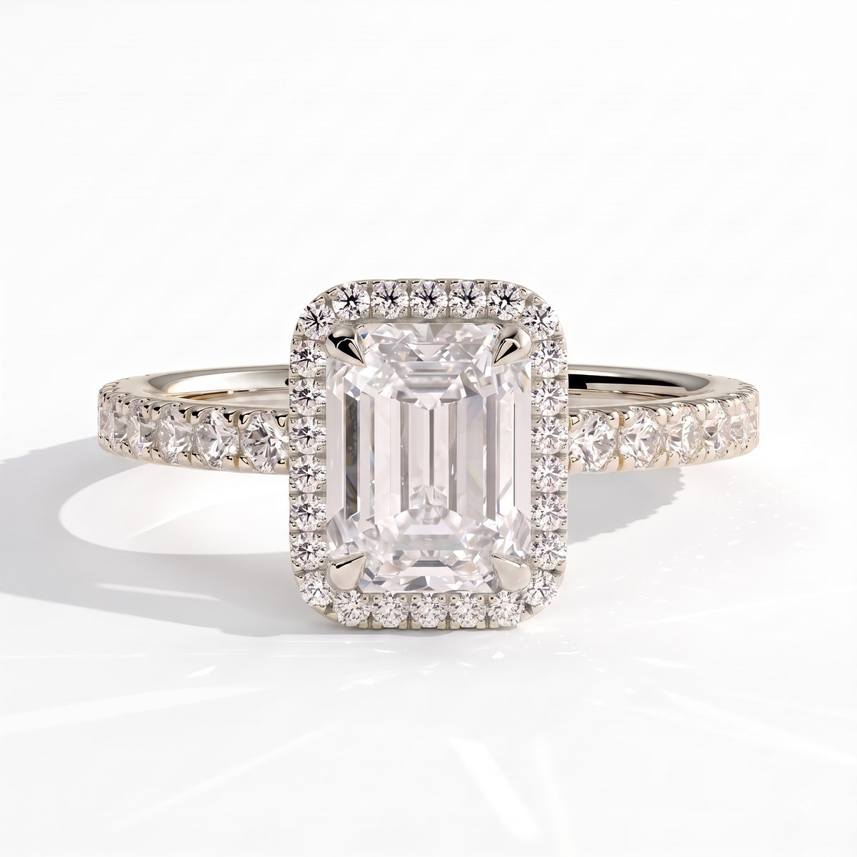 Emerald lab-grown diamond halo engagement ring in 18K (750) white gold, front view 
