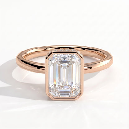 Emerald lab-grown diamond bezel-set halo engagement ring in 14K (585) rose gold, front view 