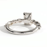 Emerald lab-grown diamond halo engagement ring in 14K (585) white gold, on white background 