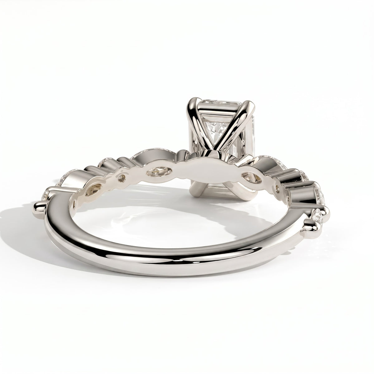 Emerald lab-grown diamond halo engagement ring in 14K (585) white gold, on white background 