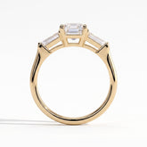 Emerald lab-grown diamond three-stone engagement ring in 14K (585) yellow gold, side profile 