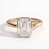 Emerald lab-grown diamond bezel-set solitaire engagement ring in 14K (585) yellow gold, front view 