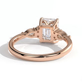 Emerald lab-grown diamond halo engagement ring in 14K (585) rose gold, on white background 