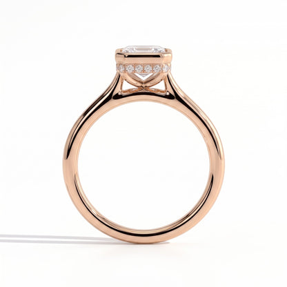Emerald lab-grown diamond bezel-set halo engagement ring in 18K (750) rose gold, side profile 