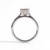 Emerald lab-grown diamond bezel-set halo engagement ring in 18K (750) white gold, side profile 