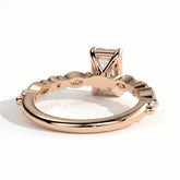 Emerald lab-grown diamond halo engagement ring in 18K (750) rose gold, on white background 