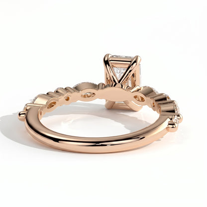 Emerald lab-grown diamond halo engagement ring in 18K (750) rose gold, on white background 
